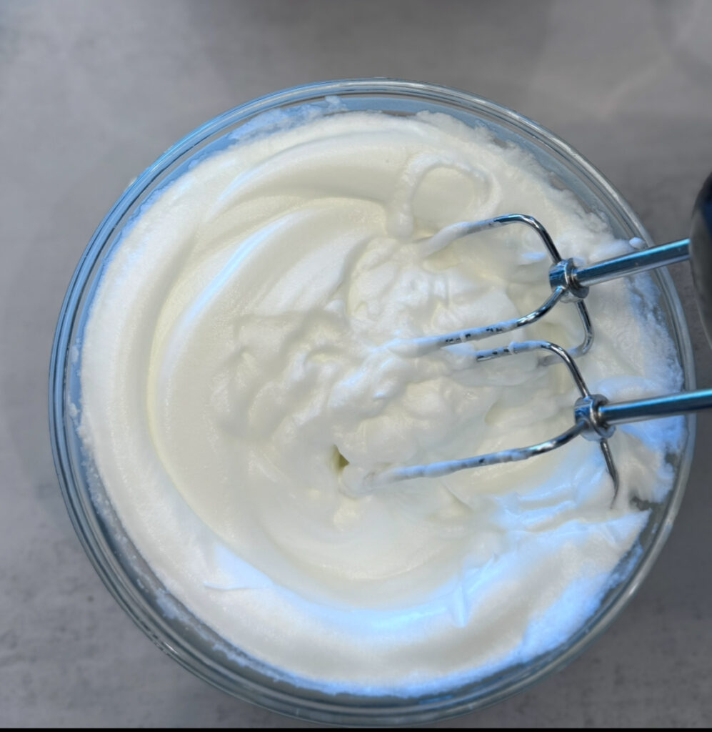 When done cooking, allow the Instant Pot to natural release, then remove Also just before assembling, make the cream: In a large bowl, combine the heavy cream, sour cream, liqueur, and vanilla.

Whisking by hand or using an electric mixer set on medium speed, beat the mixture just until soft peaks form, 5 to 10 minutes if beating by hand or about 3 minutes is using an electric mixer. meats, shred, set aside and discard the bones.