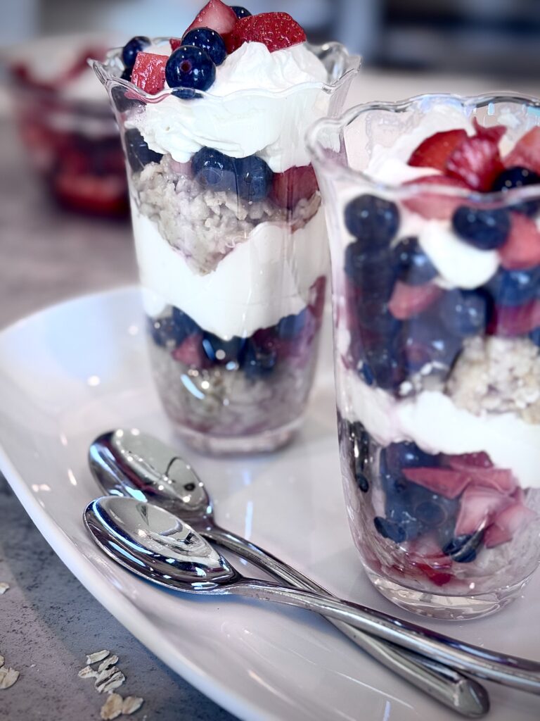 To assemble the parfait, layer in each glass 2 tablespoons oatmeal, then 2 tablespoons drained berries, then 2 tablespoon Chantilly cream, then another 2 tablespoons oatmeal. Top with berries, dividing them evenly, and end with 1 tablespoon Chantilly cream on top of parfait witha few more berries for garnish. Serve at onece, with long-handled spoon.