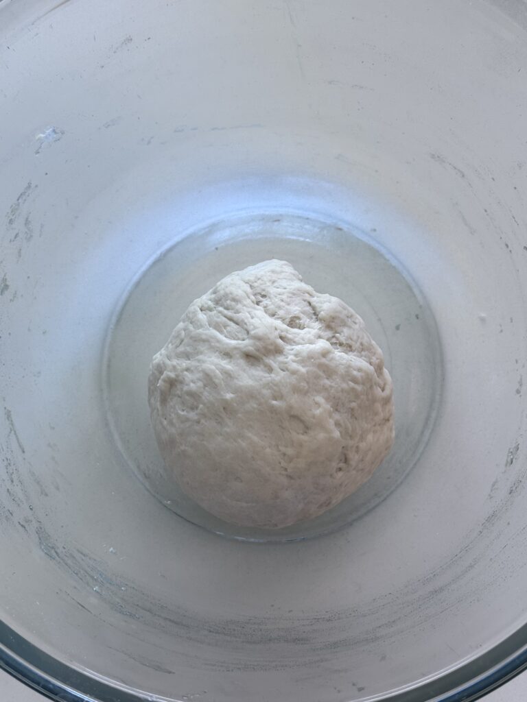 Turn the dough out onto a well-floured, clean work surface and knead until smooth and elastic, 6-7 minutes.