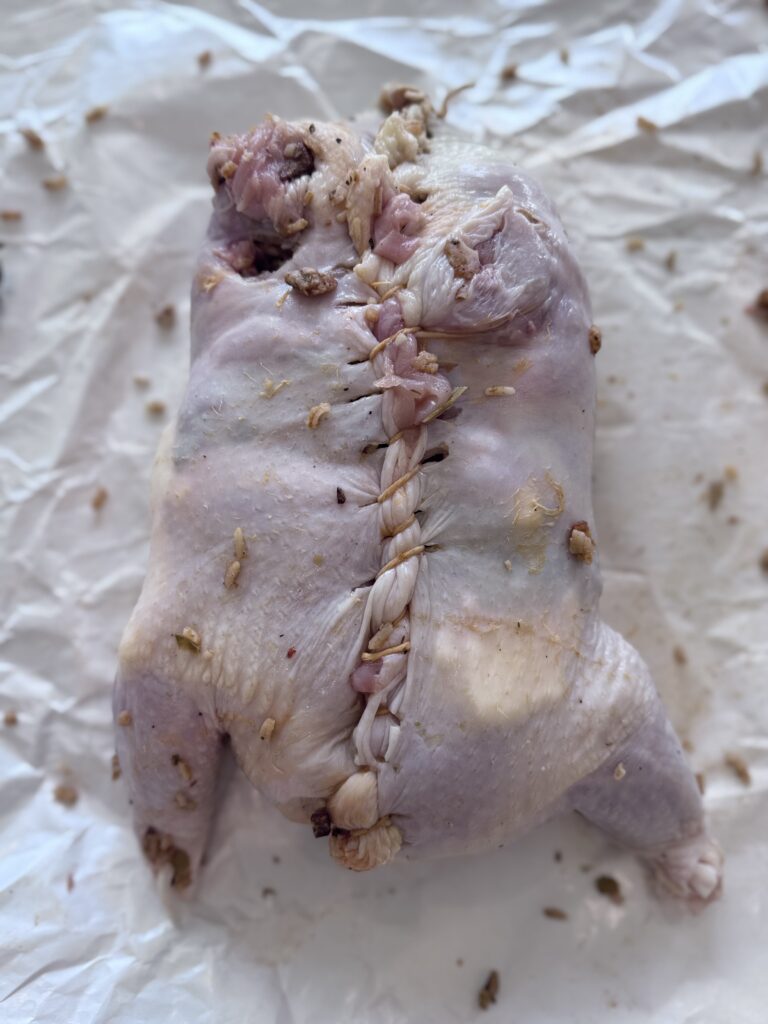 Preheat the oven to 350°F. Truss the chicken with butcher twine.