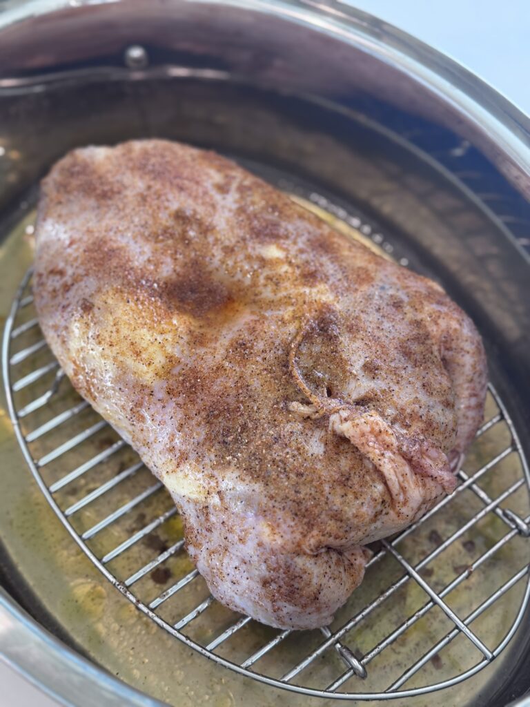 Rub more Cajun seasoning on the chicken if needed. 
Roast covered until the internal temperature reaches 120°F, about 1 hour 15 minutes. 
Increase the oven to 400°F, uncover, and roast until the temperature reaches 165°F, about 20-30 minutes. 