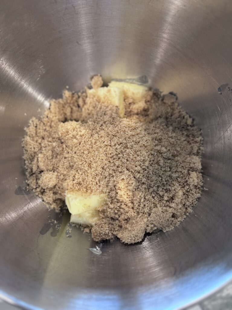 Mix Wet Ingredients: In a large bowl, cream together the butter, oil, and brown sugar until smooth. Add the beaten egg and mix until fluffy. Stir in the sour cream and vanilla extract.